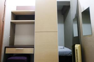 Spacious 3BR Combined Unit at Pinewood Apartment By Travelio