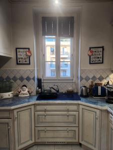 Appartements Appartement Haussmannien : photos des chambres