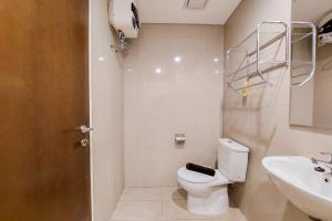 Homey and Simply 1BR M-Town Signature Apartment By Travelio