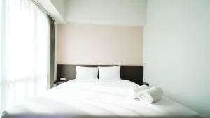 Cozy Stay 2BR at The Square Surabaya Apartment By Travelio - Siwalapkerto