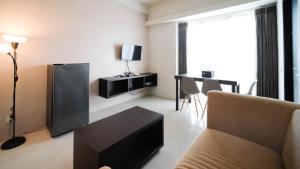 Cozy Stay 2BR at The Square Surabaya Apartment By Travelio
