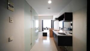 Cozy Stay 2BR at The Square Surabaya Apartment By Travelio