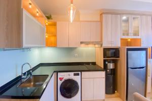 Nice and Elegant 2BR at Menteng Park Apartment By Travelio