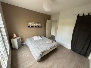 Maisons de vacances Maison 4 chambres avec jardin : photos des chambres