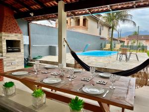 Casa com piscina 500m da praia condomínio Morada da Praia