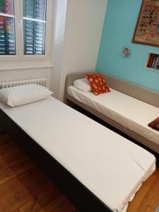 Appartements Le Palmier, Maison de ville, 3 chambres et jardin/terrasse : photos des chambres