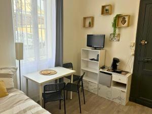 Appartements Mini Nid - Centre - Wifi - Equipe - Cosy : photos des chambres