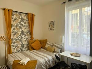 Appartements Mini Nid - Centre - Wifi - Equipe - Cosy : photos des chambres