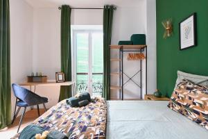 Appartements Maison climatisee Gare a 10 min, ideale familles MaisonCarreeConciergerie : photos des chambres