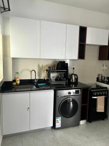 1 Bedroom with a Washing Machine