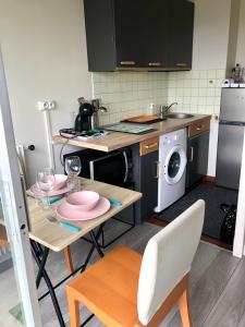 Appartements Appartement luxueux avec balcon a La Defense : photos des chambres