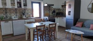 Appartements L'Oustal : photos des chambres
