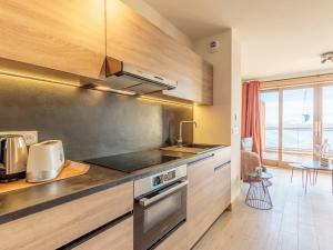 Duplex cosy avec piscine et spa, pied des pistes - FR-1-461A-25