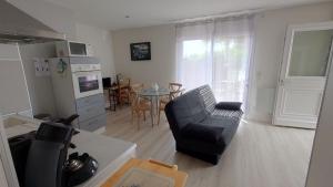 Appartements WELCOME Logement avec terrasse proche Bordeaux : photos des chambres