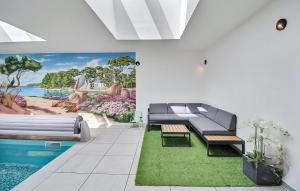 Maisons de vacances Cozy Home In Bourbriac : photos des chambres