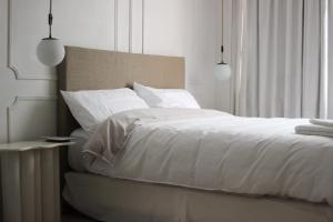 Alójate en el corazón de Mendoza . Angélica Downtown