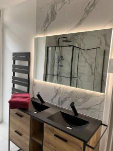 Appartements Le Chaleureux Luchonnais : photos des chambres