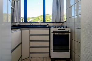 Apto a 350 metros da praia em Jurerê PD1457