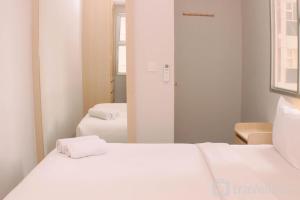 Pleasurable 2BR Transpark Juanda Apartment By Travelio