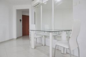 Spacious 3BR at Green Central City Glodok Apartment By Travelio
