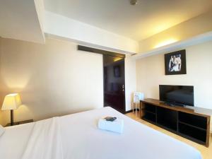 Cozy 1BR Apartment at Braga City Walk By Travelio