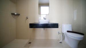 Minimalist with Beautiful View 2BR at Grand Sungkono Lagoon Apartment By Travelio