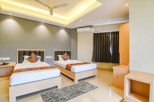 FabHotel JP - Nr Sataragachhi Railway Station