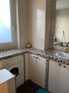 Appartements Appartement porte de paris : photos des chambres