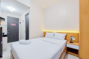 Minimalist Studio Apartment at Serpong Garden By Travelio