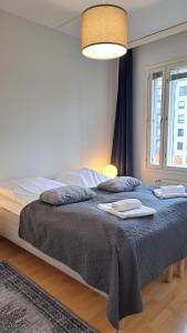 Kotimaailma Apartments - Saunallinen & parvekkeellinen kaksio - Tampellan Esplanadi