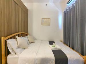 1BR Condotel with Balcony at FAME Residences #FM55