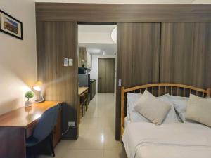 1BR Condotel with Balcony at FAME Residences #FM55