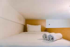 Homey and Modern Studio Apartment at Akasa Pure Living BSD By Travelio