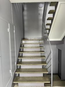 Appartements Charmant Studio : photos des chambres