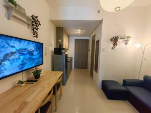 1BR Condotel with Balcony at FAME Residences #FM54