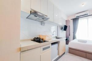 Comfy and Best Choice Studio at Sky House BSD Apartment By Travelio