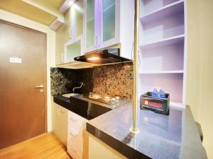 Relaxing Studio Room at Suites @Metro Apartment By Travelio