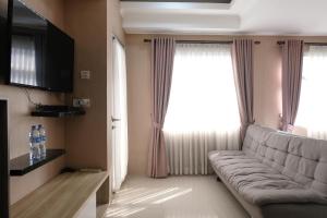 Spacious Studio with Extra Room at Grand Asia Afrika Apartment By Travelio