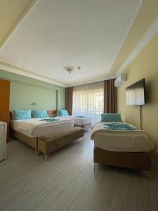 Family Room with Balcony room in Grand Didyma Hotel