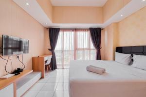 Comfort Living and High Floor Studio Casa de Parco Apartment By Travelio