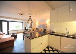 Centraal gelegen gezellig verblijf met groot terras