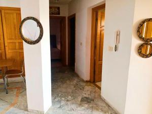 Charmant Appartement 2 chambres avec Internet et Vue Panoramique - au Cœur du Quartier Prestigieux dEnnasr 2, Proche de Toutes Commodités - Service Navette