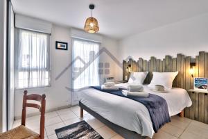 Appartements LocaLise - A02 - Appartement de plain-pied - terrasse - Juste a cote de la plage - Centre et port a pied - Wifi inclus - Draps inclus - Animaux bienvenus : photos des chambres