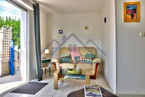 Appartements LocaLise - A02 - Appartement de plain-pied - terrasse - Juste a cote de la plage - Centre et port a pied - Wifi inclus - Draps inclus - Animaux bienvenus : photos des chambres