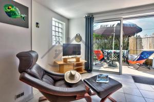 Appartements LocaLise - A02 - Appartement de plain-pied - terrasse - Juste a cote de la plage - Centre et port a pied - Wifi inclus - Draps inclus - Animaux bienvenus : photos des chambres