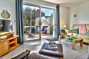 Appartements LocaLise - A02 - Appartement de plain-pied - terrasse - Juste a cote de la plage - Centre et port a pied - Wifi inclus - Draps inclus - Animaux bienvenus : photos des chambres