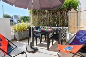 Appartements LocaLise - A02 - Appartement de plain-pied - terrasse - Juste a cote de la plage - Centre et port a pied - Wifi inclus - Draps inclus - Animaux bienvenus : photos des chambres