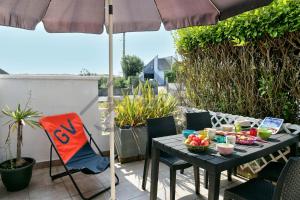 Appartements LocaLise - A02 - Appartement de plain-pied - terrasse - Juste a cote de la plage - Centre et port a pied - Wifi inclus - Draps inclus - Animaux bienvenus : photos des chambres