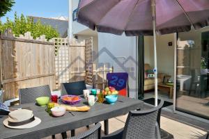 Appartements LocaLise - A02 - Appartement de plain-pied - terrasse - Juste a cote de la plage - Centre et port a pied - Wifi inclus - Draps inclus - Animaux bienvenus : photos des chambres