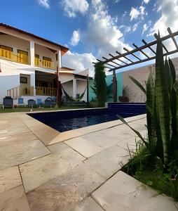 Suítes em pousada com piscina climatizada e café da manhã - Cerrado 07